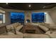 The outdoor patio has two sofas, chairs, a stone fireplace, and recessed lighting at 21442 E Excelsior Ave, Queen Creek, AZ 85142
