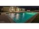 Swimming pool with stone-paver surround in backyard of well-maintained, upscale home at 21442 E Excelsior Ave, Queen Creek, AZ 85142
