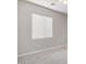 Neutral bedroom with carpeted floors, a large window with blinds, and a ceiling fan at 227 E Carob Dr, Chandler, AZ 85286