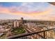Expansive city views at sunset from the balcony overlooking the downtown skyline and surrounding landscape at 2323 N Central Ave # 1902, Phoenix, AZ 85004