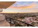 Balcony view with wrought iron railing overlooking the city skyline at sunset at 2323 N Central Ave # 1902, Phoenix, AZ 85004