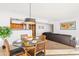 A dining space featuring a black sofa, and an open view to the dining area at 2323 N Central Ave # 1902, Phoenix, AZ 85004