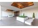 Spacious building lobby featuring neutral walls, tile floors, recessed lighting, and potted plants at 2323 N Central Ave # 1902, Phoenix, AZ 85004