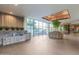 Bright lobby area featuring tile floors, concrete walls, large windows, water features, and beautiful planters at 2323 N Central Ave # 1902, Phoenix, AZ 85004