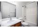 Cozy bathroom featuring a toilet, shower, and a wood vanity with sink at 23804 N High Dunes Dr, Florence, AZ 85132