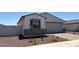 Attractive one-story home featuring a two-car garage and meticulously maintained landscaping at 24369 W La Salle St, Buckeye, AZ 85326