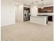 Modern kitchen featuring stainless steel appliances, granite countertops, and ample storage space at 24369 W La Salle St, Buckeye, AZ 85326