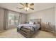 Comfortable bedroom with neutral walls, natural light, and matching furniture at 3423 E Superior Rd, San Tan Valley, AZ 85143