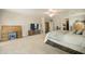 A spacious main bedroom featuring neutral walls, carpet, and ensuite bathroom at 3423 E Superior Rd, San Tan Valley, AZ 85143