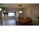 Dining area featuring a dining table and view into the living room and kitchen at 3708 W Redfield Rd, Phoenix, AZ 85053