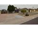 Charming single-story home featuring a well-manicured front yard and a circular driveway at 3708 W Redfield Rd, Phoenix, AZ 85053
