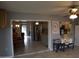 Bright kitchen with stainless steel appliances and view of dining room with open concept design at 3708 W Redfield Rd, Phoenix, AZ 85053