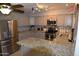 Modern kitchen featuring stainless steel appliances, gray cabinets, and granite countertops at 3708 W Redfield Rd, Phoenix, AZ 85053