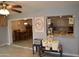 Bright kitchen with open layout, stylish granite countertops, and adjacent dining area at 3708 W Redfield Rd, Phoenix, AZ 85053