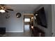 Open-concept living room and dining area with tile floors, ceiling fan, and open layout at 3708 W Redfield Rd, Phoenix, AZ 85053