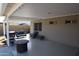 Covered patio area with string lights and dark patio furniture at 3708 W Redfield Rd, Phoenix, AZ 85053