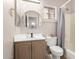 Bathroom showcases a vanity, commode, and shower with neutral color palette at 3765 E Del Rio St, Gilbert, AZ 85295