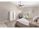 This bedroom features a ceiling fan, closet, and private access to the backyard at 3765 E Del Rio St, Gilbert, AZ 85295