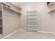 This walk-in closet is ready for your personal touch with existing shelves and hanging rods at 3765 E Del Rio St, Gilbert, AZ 85295