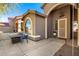 Inviting front entry with outdoor seating, a landscaped yard, and beautiful natural light at 3765 E Del Rio St, Gilbert, AZ 85295