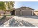 Charming single-story home featuring a two-car garage, landscaped front yard, and neutral color palette at 3765 E Del Rio St, Gilbert, AZ 85295