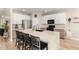 Stylish kitchen showcases a large island with seating, stainless steel appliances, and sleek countertops at 3765 E Del Rio St, Gilbert, AZ 85295