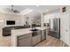 Updated kitchen features a breakfast bar that opens to a living room at 3765 E Del Rio St, Gilbert, AZ 85295