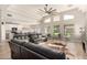 Bright and airy living room with high ceilings, modern lighting, and an open floor plan at 3765 E Del Rio St, Gilbert, AZ 85295