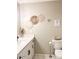 Bathroom features a sleek vanity with white countertop, modern finishes, and neutral tones at 4026 W Saint John Rd, Glendale, AZ 85308