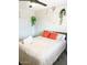Cozy bedroom features a comfy bed, a ceiling fan, and hanging plants as decorations at 4026 W Saint John Rd, Glendale, AZ 85308