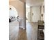 Inviting foyer with tile flooring that leads into a spacious living room at 4026 W Saint John Rd, Glendale, AZ 85308