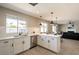 Updated kitchen with white countertops, stainless steel appliances, and ample lighting at 4026 W Saint John Rd, Glendale, AZ 85308
