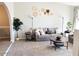 Cozy living room with stylish decor, neutral tones, and comfortable seating at 4026 W Saint John Rd, Glendale, AZ 85308
