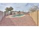 A beautiful backyard pool featuring updated concrete, coping, and gravel landscaping at 406 E Saguaro St, Casa Grande, AZ 85122