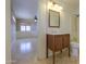 A vanity and toilet can be seen from the doorway between rooms at 406 E Saguaro St, Casa Grande, AZ 85122