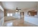 Bright living room with natural light from a window and direct access to the front door at 406 E Saguaro St, Casa Grande, AZ 85122