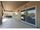 Spacious covered patio with outdoor furniture and a view of the backyard at 44560 W Copper Trl, Maricopa, AZ 85139