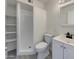 Bathroom featuring a walk-in shower, shelving, modern vanity, and tile flooring at 470 S Daley --, Mesa, AZ 85204