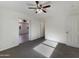 Bedroom with neutral carpet and a ceiling fan with a light, offering a comfortable space at 470 S Daley --, Mesa, AZ 85204