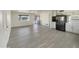 Inviting living area with vinyl floors, ample natural light, and direct access to the updated kitchen for easy living at 470 S Daley --, Mesa, AZ 85204