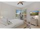 Well-lit bedroom featuring white walls, corner windows, and desert views at 6128 E Brilliant Sky Dr, Scottsdale, AZ 85266
