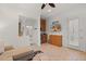 Cozy living space with tiled floors, a small kitchen area, and an adjacent bathroom at 6128 E Brilliant Sky Dr, Scottsdale, AZ 85266