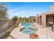 Inviting pool and spa area with desert landscaping and mountain views, perfect for relaxation at 6128 E Brilliant Sky Dr, Scottsdale, AZ 85266