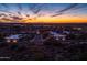 Stunning aerial view of the neighborhood at sunset at 6230 S Mesa Vista Dr, Gold Canyon, AZ 85118