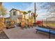 Expansive backyard with desert plants, a grill, and comfortable seating for outdoor enjoyment at 6230 S Mesa Vista Dr, Gold Canyon, AZ 85118