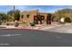 Welcoming entrance to the community spa and pool facilities surrounded by manicured landscaping and desert plants at 6230 S Mesa Vista Dr, Gold Canyon, AZ 85118