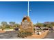 Gold Canyon Golf Resort entrance sign with address and desert landscaping at 6230 S Mesa Vista Dr, Gold Canyon, AZ 85118