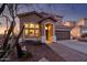 Beautiful two-story home with a well-maintained front yard, brick pathway and desert landscaping at 6230 S Mesa Vista Dr, Gold Canyon, AZ 85118