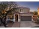 Charming two-story home with a well-kept lawn, desert landscaping, and an inviting facade at 6230 S Mesa Vista Dr, Gold Canyon, AZ 85118