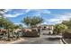 Beautiful two-story home with a tile roof, gated entry, and desert landscaping at 6230 S Mesa Vista Dr, Gold Canyon, AZ 85118